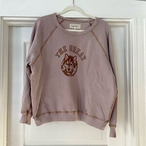 The GREAT College Sweatshirt. Lavender with contrast stitching. Wolf graphic.